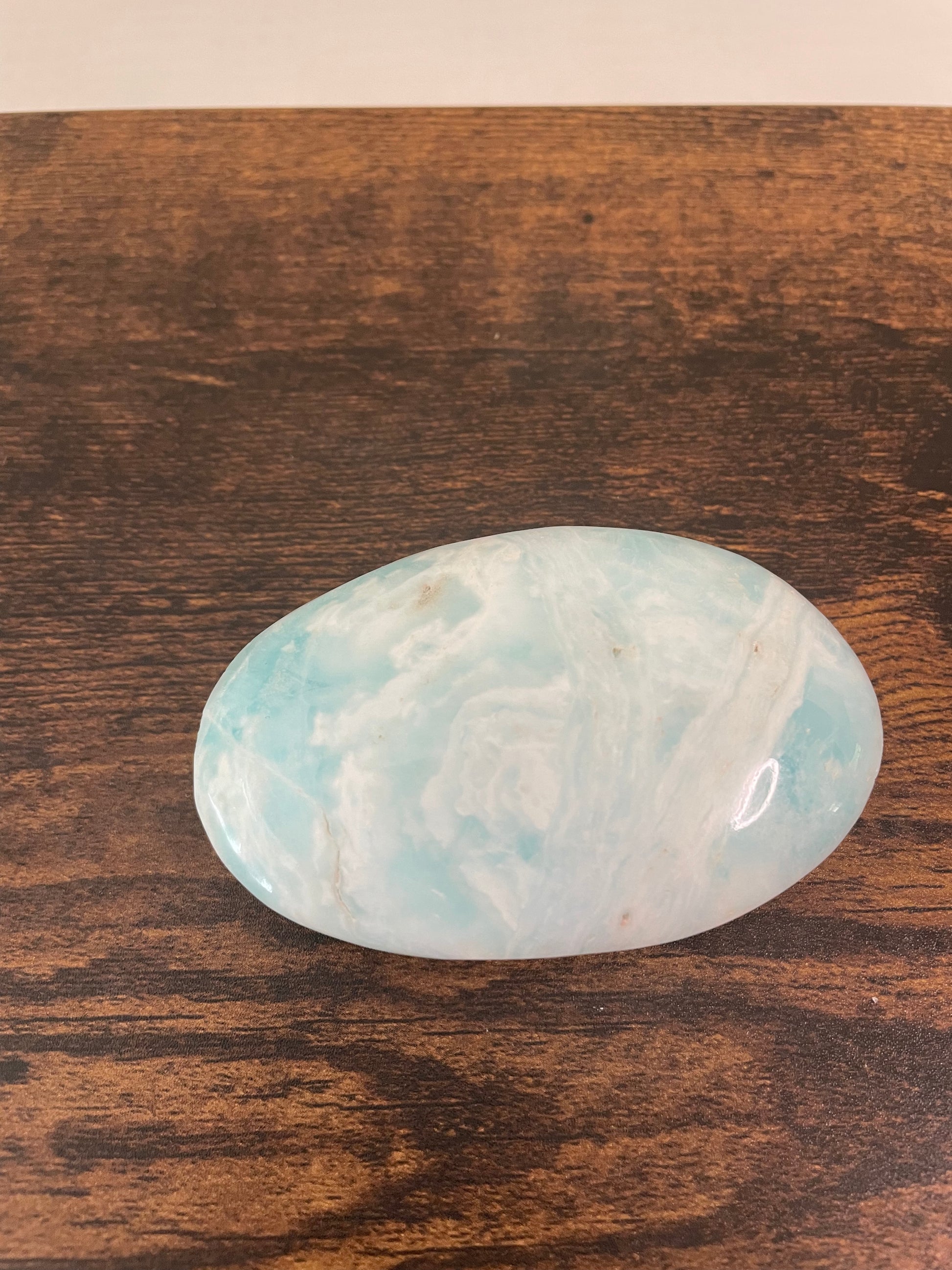 Caribbean Blue Calcite, a mesmerizing crystal with tranquil blue hues reminiscent of the Caribbean Sea, capturing the essence of calm and serenity in this unique mineral composition.
