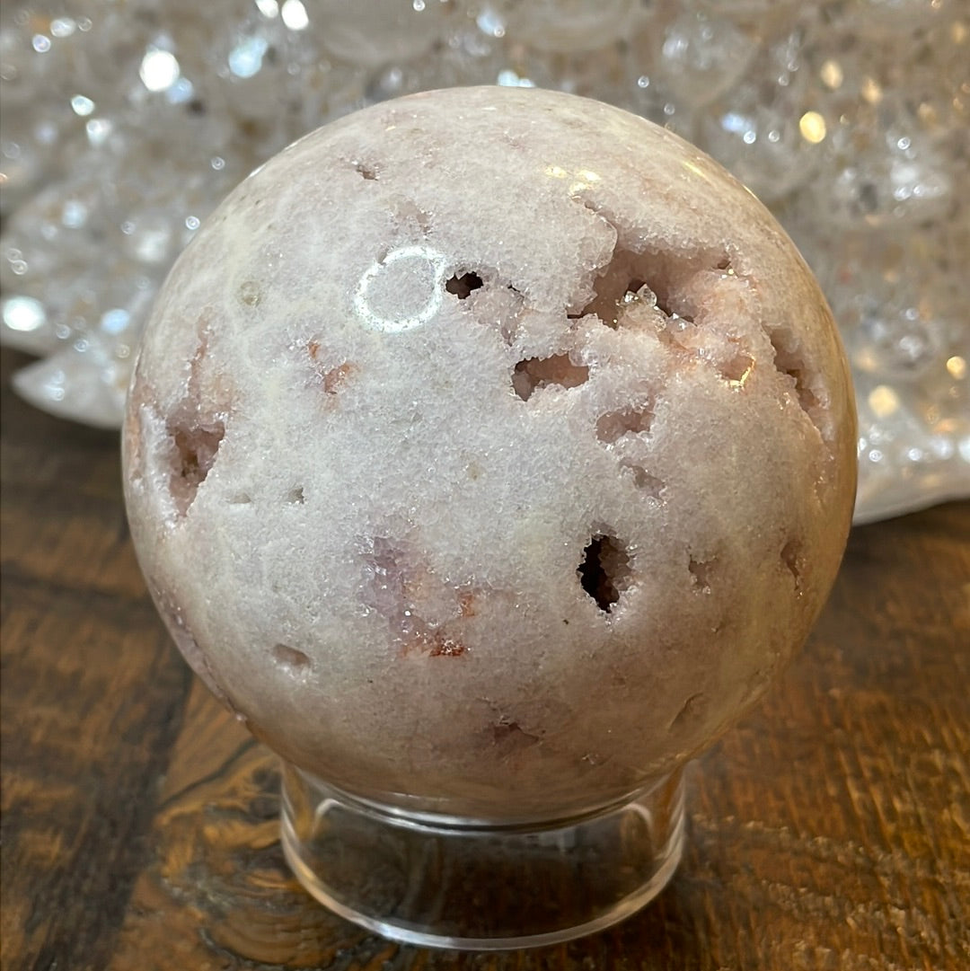 Pink Amethyst Druzy Sphere, a radiant and enchanting crystal ball showcasing delicate crystalline formations in soothing pink tones. 