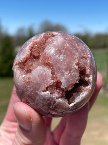 Pink Amethyst Sphere: Radiant crystal ball with delicate pink tones