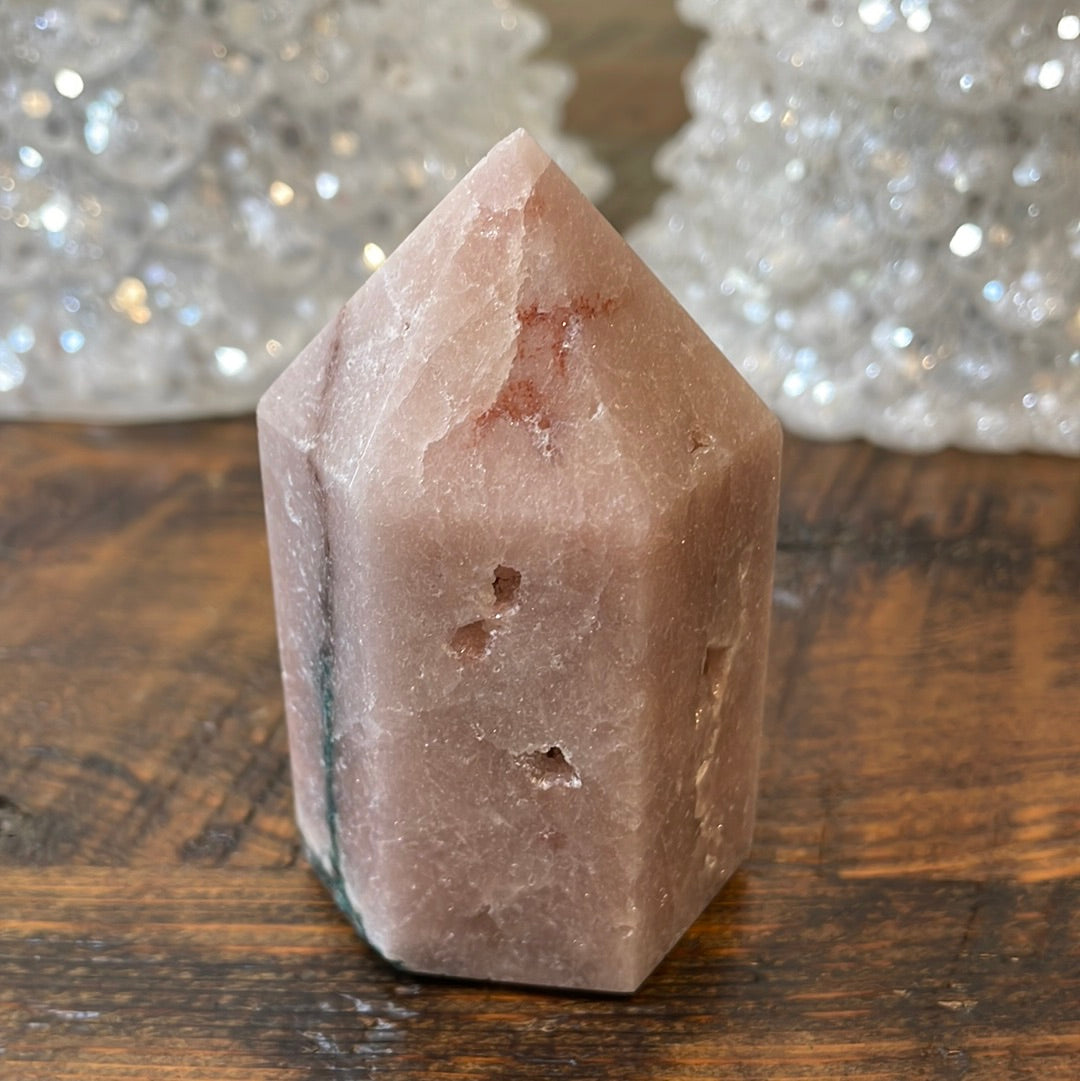 Pink Amethyst druzy tower, showcasing delicate crystalline formations in a soothing hue for a truly enchanting natural beauty.