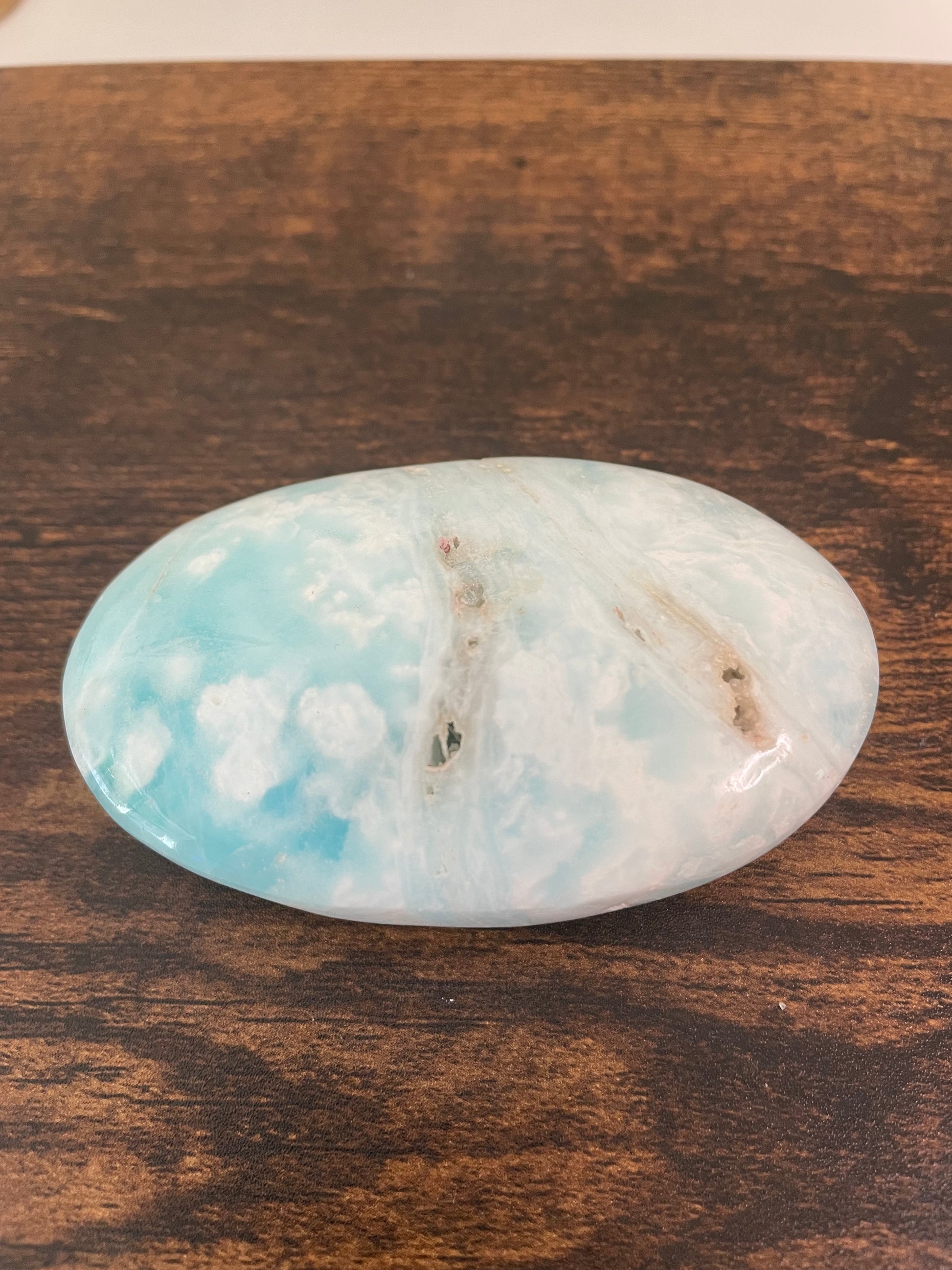 Caribbean Blue Calcite, a mesmerizing crystal with tranquil blue hues reminiscent of the Caribbean Sea, capturing the essence of calm and serenity in this unique mineral composition.