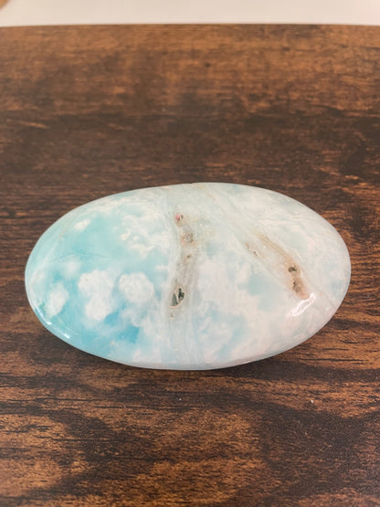 Caribbean Blue Calcite, a mesmerizing crystal with tranquil blue hues reminiscent of the Caribbean Sea, capturing the essence of calm and serenity in this unique mineral composition.