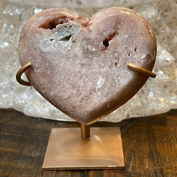 Pink Amethyst druzy hearts elagantly presented on custom metal stands, blending romance and sophistication in a crystalline showcase.