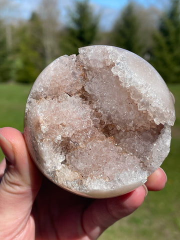 Pink Amethyst Sphere: Radiant crystal ball with delicate pink tones