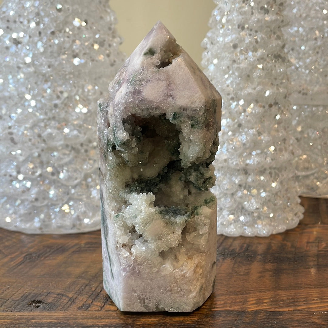 Pink Amethyst druzy tower, showcasing delicate crystalline formations in a soothing hue for a truly enchanting natural beauty.