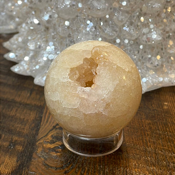 Pink Amethyst Druzy Sphere, a radiant and enchanting crystal ball showcasing delicate crystalline formations in soothing pink tones. 