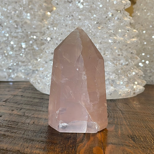Elegant Rose Quartz tower, featuring soft pink tones and a graceful crystal formation for a serene and enchanting aesthetic