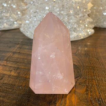 Elegant Rose Quartz tower, featuring soft pink tones and a graceful crystal formation for a serene and enchanting aesthetic