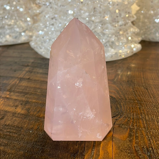 Elegant Rose Quartz tower, featuring soft pink tones and a graceful crystal formation for a serene and enchanting aesthetic