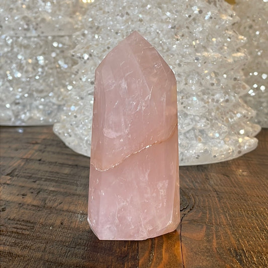 Elegant Rose Quartz tower, featuring soft pink tones and a graceful crystal formation for a serene and enchanting aesthetic