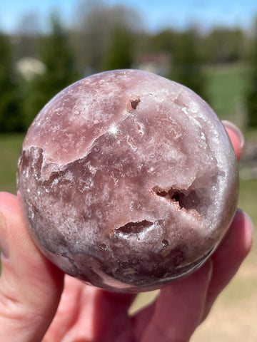 Pink Amethyst Sphere: Radiant crystal ball with delicate pink tones