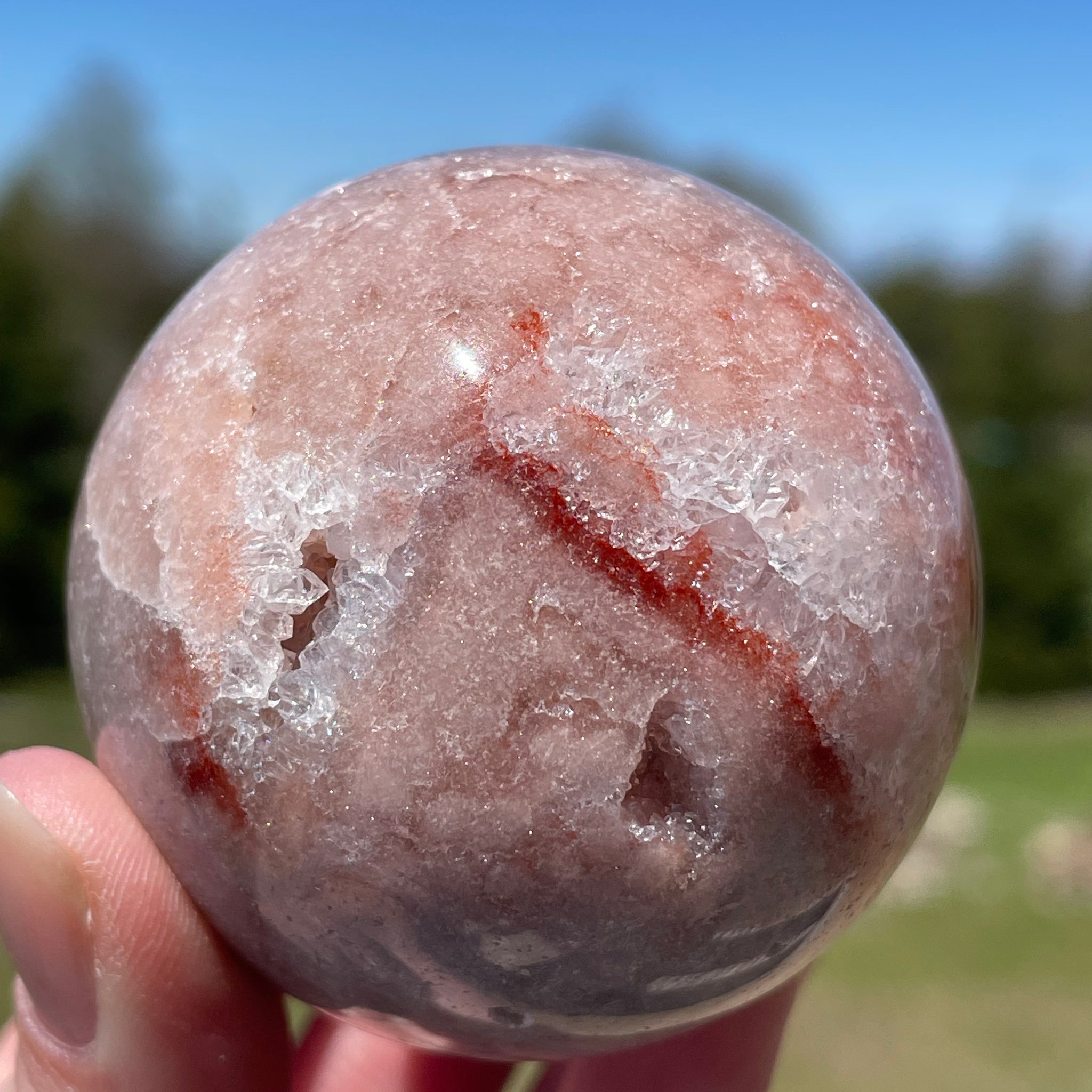 Pink Amethyst Sphere: Radiant crystal ball with delicate pink tones