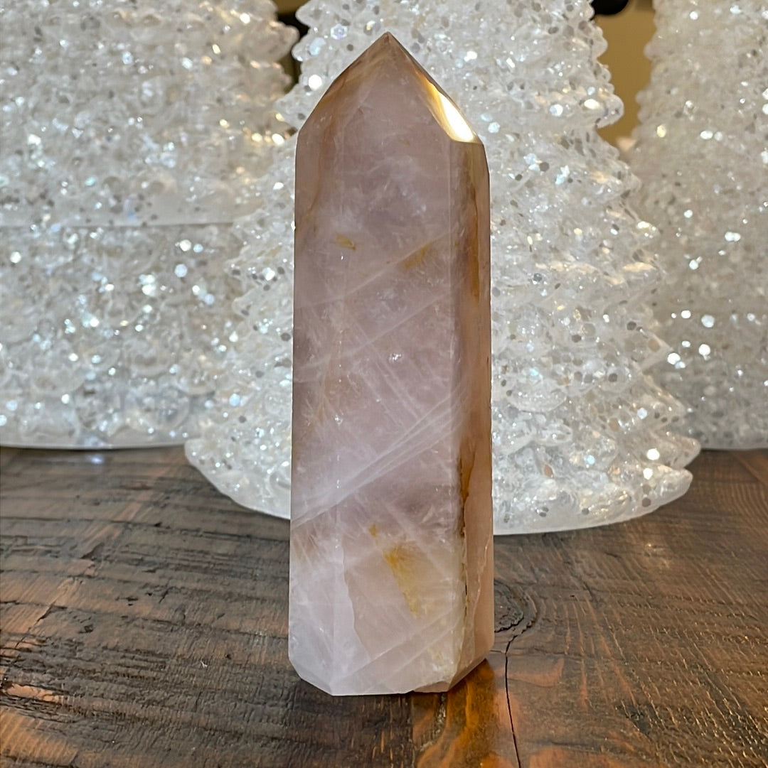 Elegant Rose Quartz tower, featuring soft pink tones with golden healer and a graceful crystal formation for a serene and enchanting aesthetic