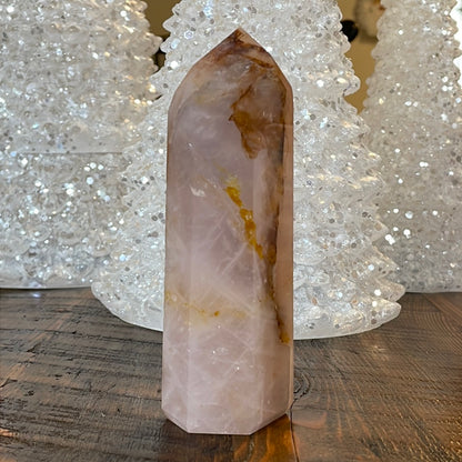 Elegant Rose Quartz tower, featuring soft pink tones with golden healer and a graceful crystal formation for a serene and enchanting aesthetic