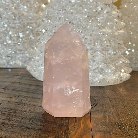 Elegant Rose Quartz tower, featuring soft pink tones and a graceful crystal formation for a serene and enchanting aesthetic