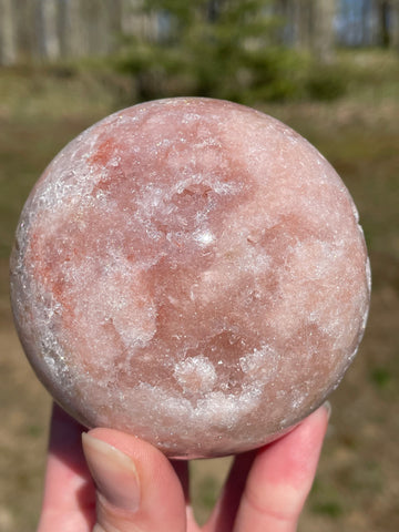 Pink Amethyst Sphere: Radiant crystal ball with delicate pink tones