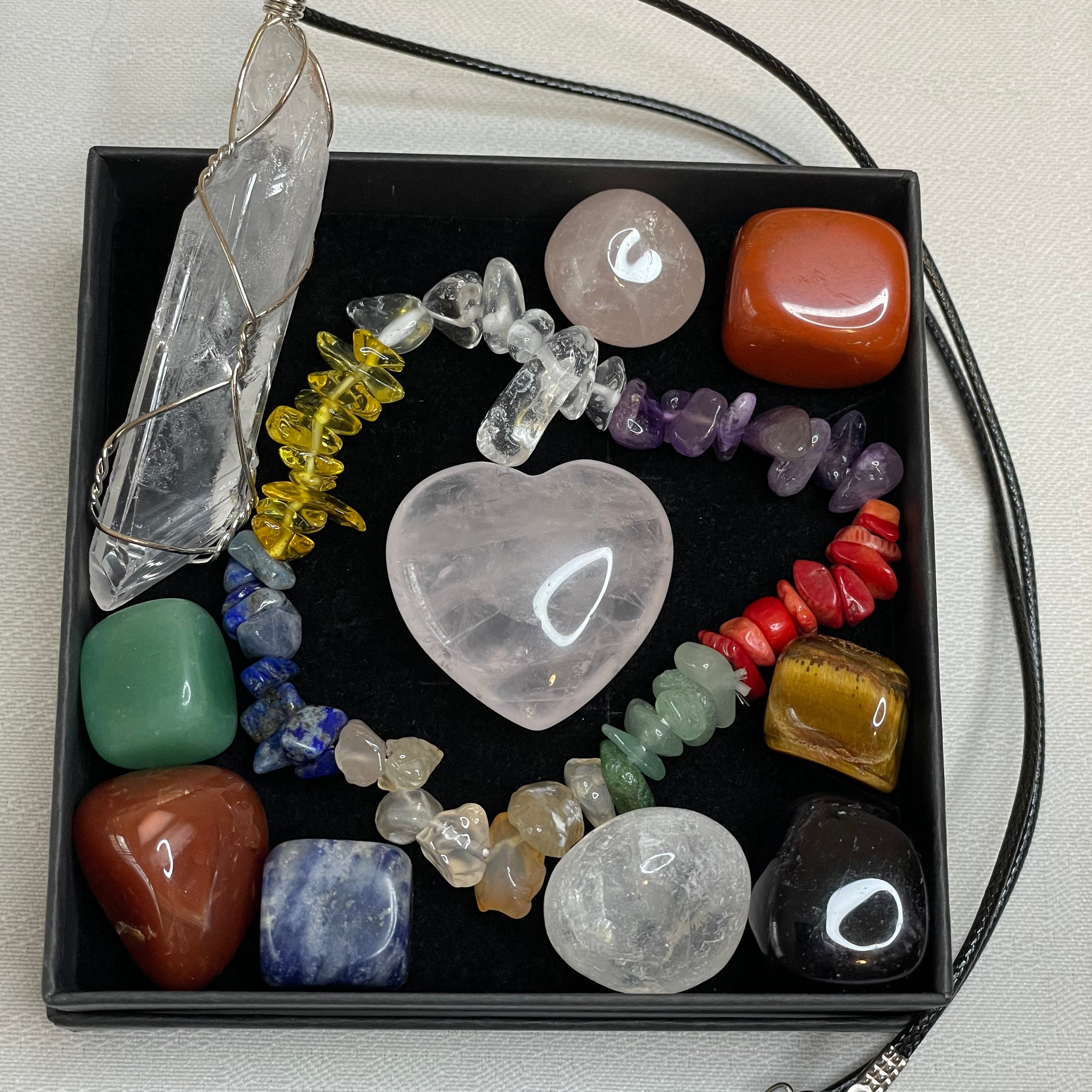 Chakra sets- a harmonious collection of crystals in vibrant colors, aligning with the body's energy centers to promote balance and well-being.