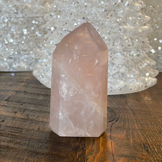 Elegant Rose Quartz tower, featuring soft pink tones and a graceful crystal formation for a serene and enchanting aesthetic