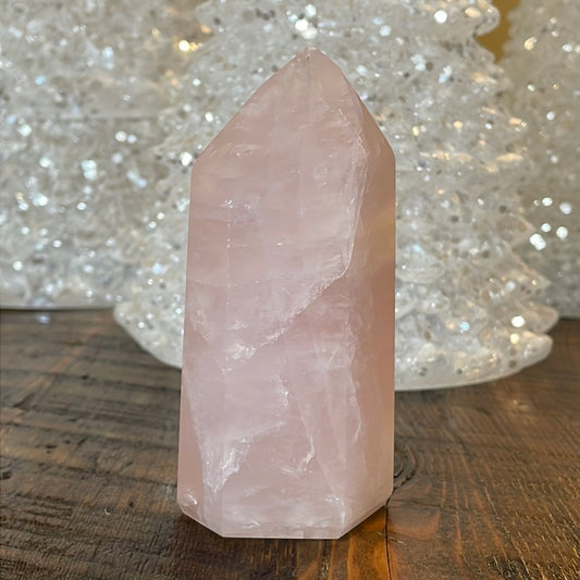 Elegant Rose Quartz tower, featuring soft pink tones and a graceful crystal formation for a serene and enchanting aesthetic