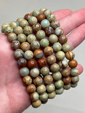 Serpentine Jasper bracelet with 8mm beads, showcasing the earthy and rich tones of Serpentine jasper, offering a blend of natural beauty and grounding energy in this stylish and versatile accessory.  