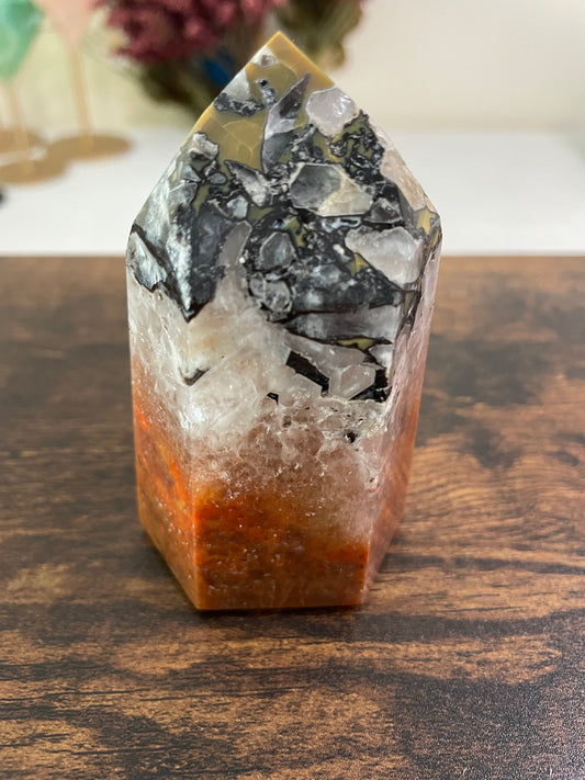 Mosaic Quartz, a captivating arrangement of Quartz crystals forming a mosaic-like pattern, showcasing the intricate beauty of nature's geological artistry in various shades and textures.