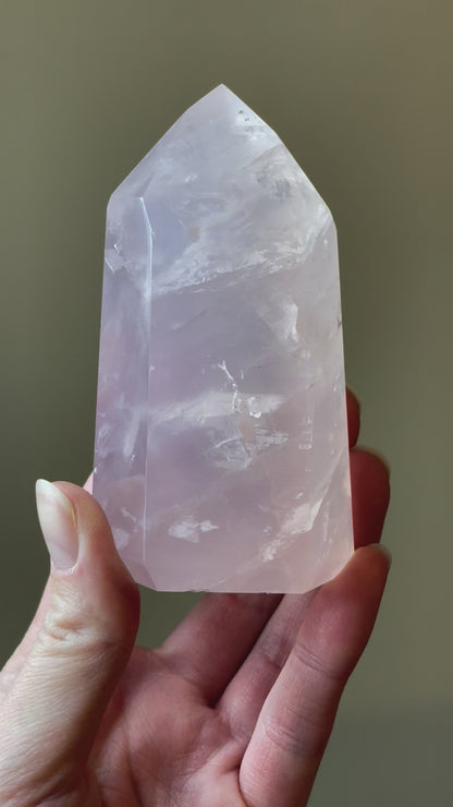 In this video, Elegant Rose Quartz tower, featuring soft pink tones and a graceful crystal formation for a serene and enchanting aesthetic