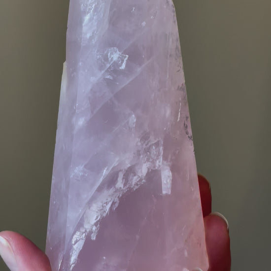 In this video, Elegant Rose Quartz tower, featuring soft pink tones and a graceful crystal formation for a serene and enchanting aesthetic
