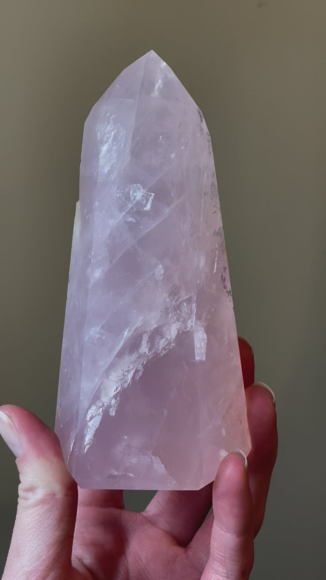 In this video, Elegant Rose Quartz tower, featuring soft pink tones and a graceful crystal formation for a serene and enchanting aesthetic