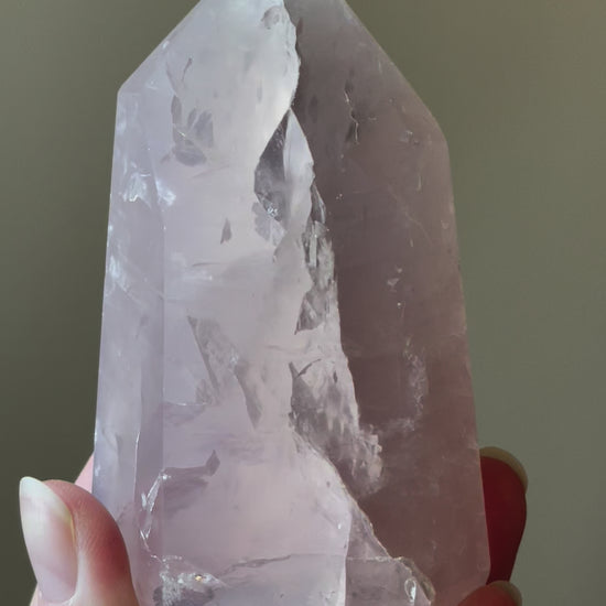 In this video, Elegant Rose Quartz tower, featuring soft pink tones and a graceful crystal formation for a serene and enchanting aesthetic