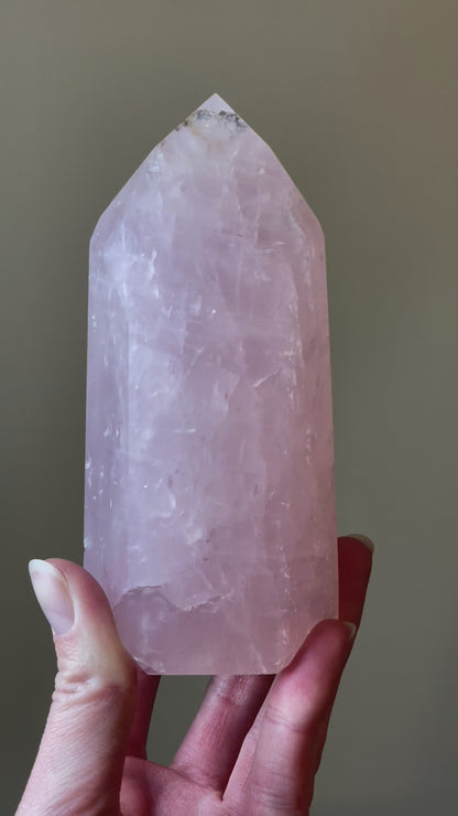 In this video, Elegant Rose Quartz tower, featuring soft pink tones and a graceful crystal formation for a serene and enchanting aesthetic