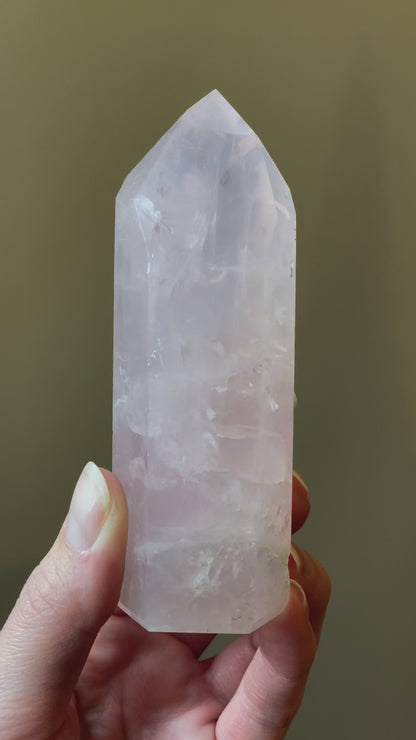 In this video, Elegant Rose Quartz tower, featuring soft pink tones and a graceful crystal formation for a serene and enchanting aesthetic