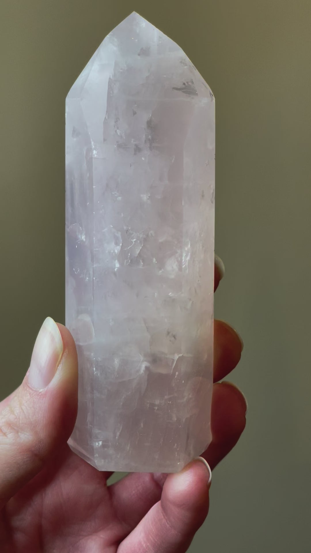 In this video, Elegant Rose Quartz tower, featuring soft pink tones and a graceful crystal formation for a serene and enchanting aesthetic