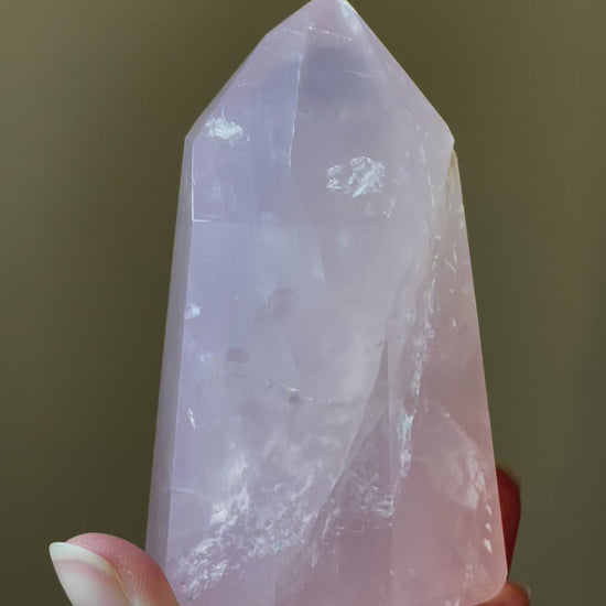 In this video, Elegant Rose Quartz tower, featuring soft pink tones and a graceful crystal formation for a serene and enchanting aesthetic