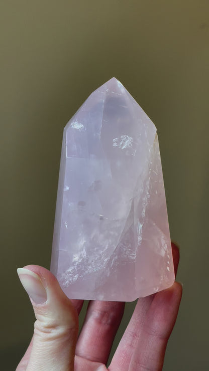 In this video, Elegant Rose Quartz tower, featuring soft pink tones and a graceful crystal formation for a serene and enchanting aesthetic