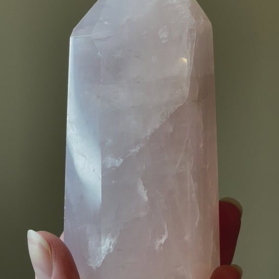In this video, Elegant Rose Quartz tower, featuring soft pink tones and a graceful crystal formation for a serene and enchanting aesthetic