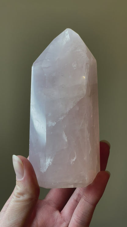 In this video, Elegant Rose Quartz tower, featuring soft pink tones and a graceful crystal formation for a serene and enchanting aesthetic