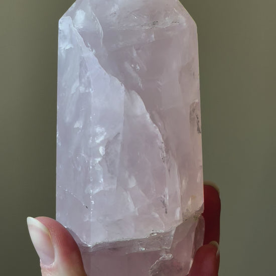 In this video, Elegant Rose Quartz tower, featuring soft pink tones and a graceful crystal formation for a serene and enchanting aesthetic