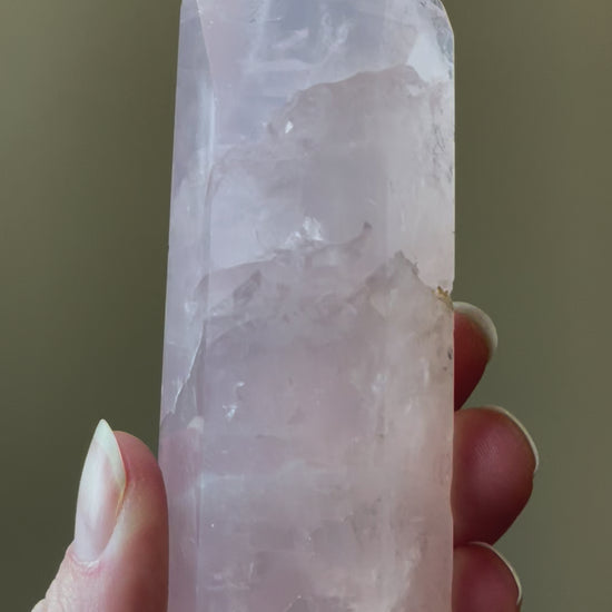 In this video, Elegant Rose Quartz tower, featuring soft pink tones and a graceful crystal formation for a serene and enchanting aesthetic
