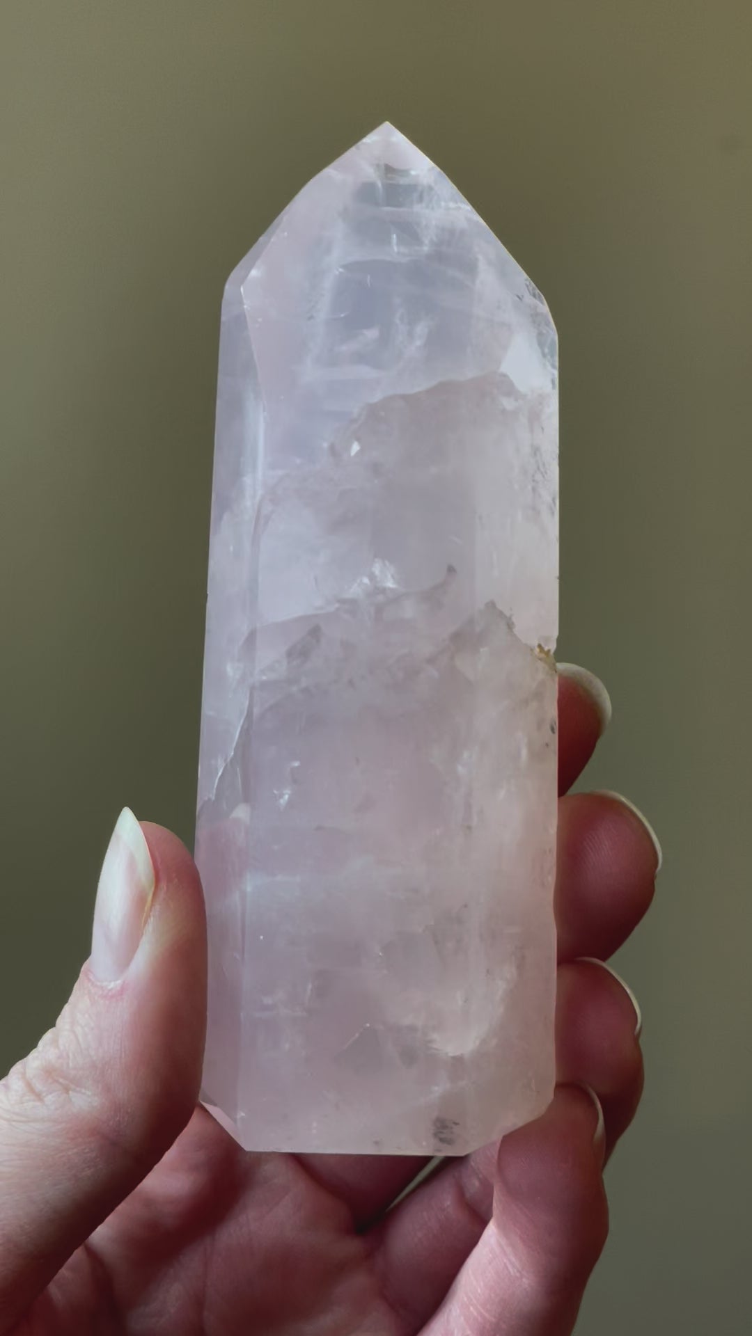 In this video, Elegant Rose Quartz tower, featuring soft pink tones and a graceful crystal formation for a serene and enchanting aesthetic
