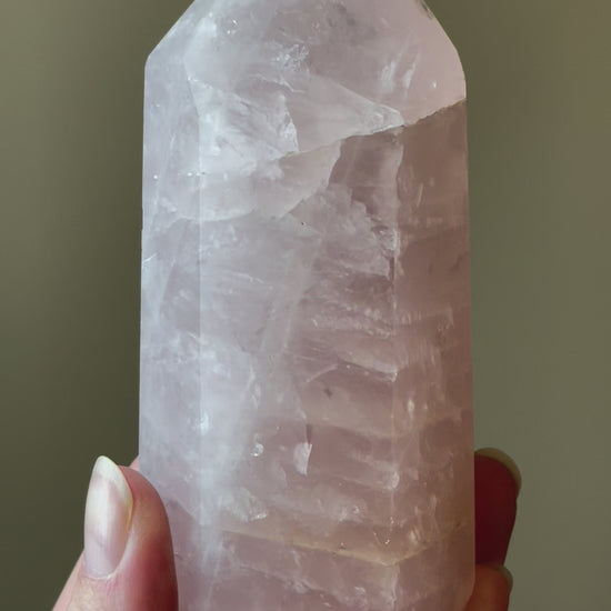 In this video, Elegant Rose Quartz tower, featuring soft pink tones and a graceful crystal formation for a serene and enchanting aesthetic