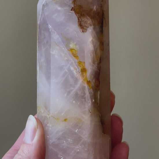 In this video, Elegant Rose Quartz tower, featuring soft pink tones with golden healer and a graceful crystal formation for a serene and enchanting aesthetic
