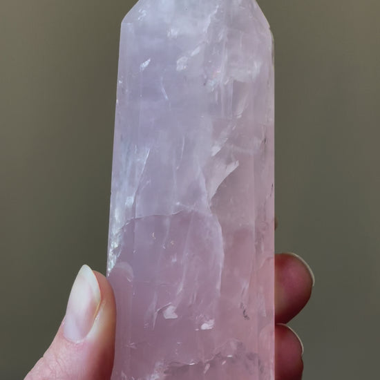 In this video, Elegant Rose Quartz tower, featuring soft pink tones and a graceful crystal formation for a serene and enchanting aesthetic