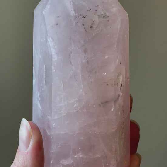 In this video, Elegant Rose Quartz tower, featuring soft pink tones and a graceful crystal formation for a serene and enchanting aesthetic