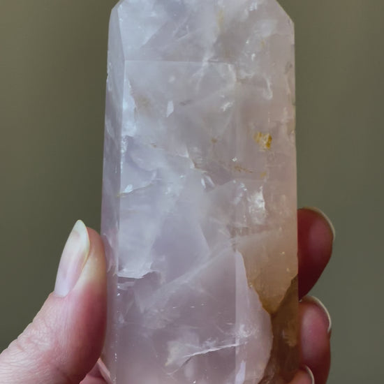 In this video, Elegant Rose Quartz tower, featuring soft pink tones with golden healer and a graceful crystal formation for a serene and enchanting aesthetic