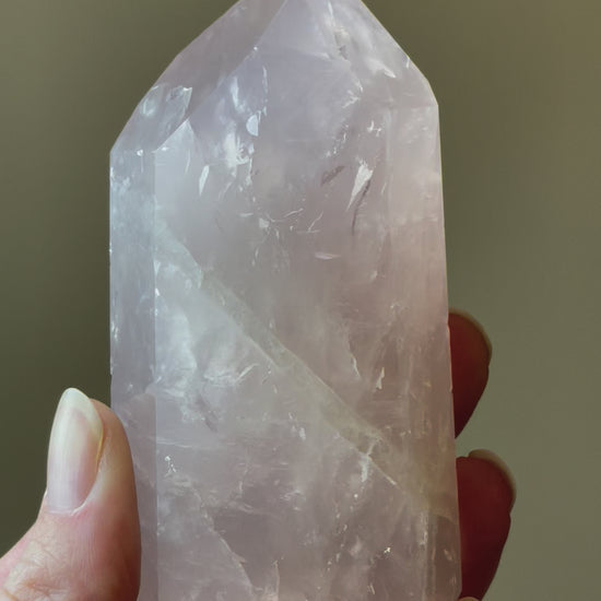 In this video, Elegant Rose Quartz tower, featuring soft pink tones and a graceful crystal formation for a serene and enchanting aesthetic