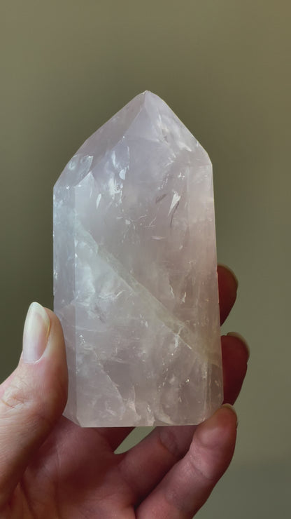 In this video, Elegant Rose Quartz tower, featuring soft pink tones and a graceful crystal formation for a serene and enchanting aesthetic