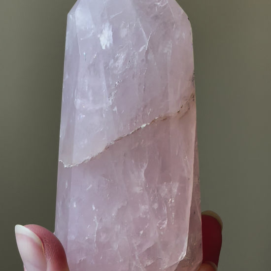 In this video, Elegant Rose Quartz tower, featuring soft pink tones and a graceful crystal formation for a serene and enchanting aesthetic