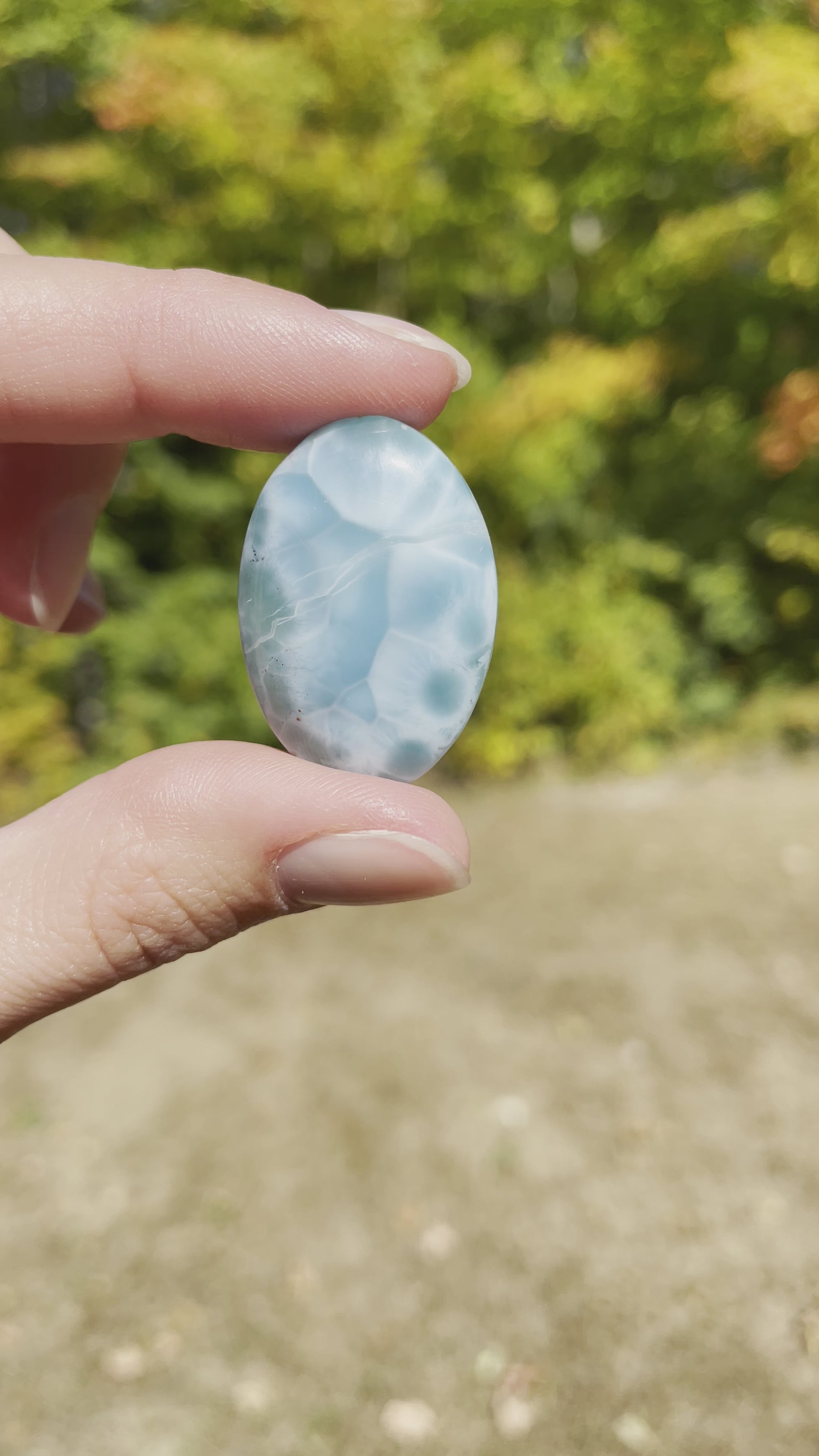In this video, Larimar has Light blue with soft white lines, Oval in shape with polished surface. It has effects on four of the seven Chakras